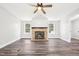 Living room with fireplace and wood-look flooring at 174 Pine Needles Dr, Lillington, NC 27546