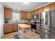 Modern kitchen with stainless steel appliances and granite countertops at 1901 Milan St, Durham, NC 27704