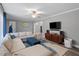 Comfortable living room with sectional sofa and ample natural light at 1901 Milan St, Durham, NC 27704