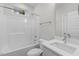 Clean bathroom featuring a shower/tub combo and modern vanity at 1917 A Essex, Durham, NC 27704
