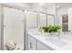 Double vanity bathroom with a walk-in shower at 1917 A Essex, Durham, NC 27704