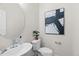 Stylish bathroom with a modern vanity and a large mirror at 1917 A Essex, Durham, NC 27704