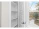 Bright pantry with ample shelving and natural light at 1917 A Essex, Durham, NC 27704