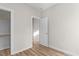 Spacious bedroom with hardwood floors and a large closet at 1917 B Essex Rd, Durham, NC 27704