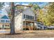 Two-story home with white siding, and a front porch at 1917 B Essex Rd, Durham, NC 27704
