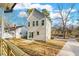 New construction home with light-colored siding and a patio at 1917 B Essex Rd, Durham, NC 27704