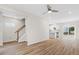 Open concept living space with hardwood floors and kitchen views at 1917 B Essex Rd, Durham, NC 27704