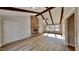 Bright living room with hardwood floors and a fireplace at 1921 Port Royal Rd, Raleigh, NC 27609