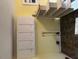 Unfinished basement with laundry hookups and storage at 209 N Watauga Ave, Dunn, NC 28334