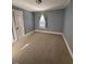 Bedroom with carpet flooring and ample natural light at 209 N Watauga Ave, Dunn, NC 28334