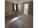 Main bedroom with ensuite bathroom access at 209 N Watauga Ave, Dunn, NC 28334
