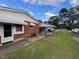 Side view of the house with carport and additional parking at 209 N Watauga Ave, Dunn, NC 28334