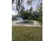 In ground pool with pool cover and storage shed at 209 N Watauga Ave, Dunn, NC 28334