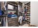 Large walk-in closet with ample shelving and hanging space at 212 Chickasaw Plum Dr, Holly Springs, NC 27540