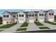 New townhouses with attached garages and well-manicured lawns at 224 Elyse Overlook Loop, Sanford, NC 27332