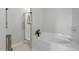 Clean bathroom with a shower, bathtub, and tile floor at 235 N Fuquay Springs Ave, Fuquay Varina, NC 27526