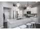 Modern kitchen with white cabinets, granite counters, and stainless steel appliances at 295 Broomside Ave, Raleigh, NC 27603