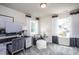 Home office with desk and comfortable seating area at 295 Broomside Ave, Raleigh, NC 27603