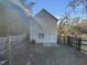 Backyard with small patio and fence at 311 Burnette St, Durham, NC 27707