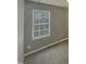 Bright bedroom featuring a window with blinds at 311 Burnette St, Durham, NC 27707