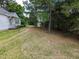 Front view of white house with green shutters and steps at 4503 Hopson Rd, Morrisville, NC 27560