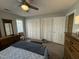 Bright bedroom with ample closet space and plush carpeting at 4631 Timbermill Ct # 301, Raleigh, NC 27612