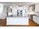 Large kitchen island with granite countertop and modern pendant lights at 503 Bendemeer Ln, Rolesville, NC 27571