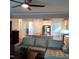 Spacious living room with light gray sectional sofa and kitchen view at 503 Bendemeer Ln, Rolesville, NC 27571