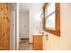 Clean bathroom with tiled shower, vanity, and window at 540 Patterson Dr, Chapel Hill, NC 27516