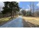 Gravel driveway through wooded area at 540 Patterson Dr, Chapel Hill, NC 27516