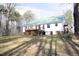 White house exterior with green roof and deck at 540 Patterson Dr, Chapel Hill, NC 27516