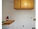 Laundry area with wood shelving and fire extinguisher at 540 Patterson Dr, Chapel Hill, NC 27516
