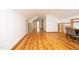 Loft with wood floors, built-in shelving, and office area at 540 Patterson Dr, Chapel Hill, NC 27516