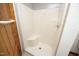 Updated shower with tile surround and curved seat at 540 Patterson Dr, Chapel Hill, NC 27516