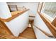 Wooden staircase leading to lower level at 540 Patterson Dr, Chapel Hill, NC 27516