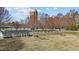 Chicken coop and goats in a fenced pasture at 5503 Rutherford Close, Pittsboro, NC 27312
