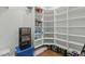 Well-organized pantry with ample shelving for storage at 5503 Rutherford Close, Pittsboro, NC 27312