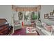 Relaxing sunroom with ample natural light and comfortable seating at 5503 Rutherford Close, Pittsboro, NC 27312