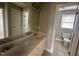 Double vanity bathroom with separate toilet area at 7513 Orchard Crest Ct, Apex, NC 27539