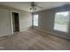 Spacious bedroom with ceiling fan and carpet at 7513 Orchard Crest Ct, Apex, NC 27539