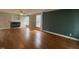 Spacious living room with hardwood floors and fireplace at 7513 Orchard Crest Ct, Apex, NC 27539