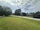 Beautiful neighborhood with lush lawns and upscale homes at 7513 Orchard Crest Ct, Apex, NC 27539