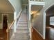 Elegant staircase leading to the upper level at 7513 Orchard Crest Ct, Apex, NC 27539
