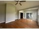 Bright sunroom featuring hardwood floors and backyard access at 7513 Orchard Crest Ct, Apex, NC 27539