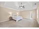 Spacious bedroom with carpeted floor and ceiling fan at 8916 Buffalo Gourd Ln, Angier, NC 27501