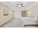 Main bedroom with ceiling fan and large bed at 8916 Buffalo Gourd Ln, Angier, NC 27501