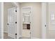 Hallway view of the home's bathroom at 8916 Buffalo Gourd Ln, Angier, NC 27501