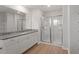 Modern bathroom with granite countertop, white cabinets, and a walk-in shower at 900 Rhino Bnd, Oxford, NC 27565