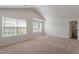 Spacious main bedroom with vaulted ceilings and carpet flooring at 900 Rhino Bnd, Oxford, NC 27565