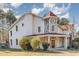 Stunning home with unique architectural details and landscaping at 105 Kingfisher Way, Louisburg, NC 27549